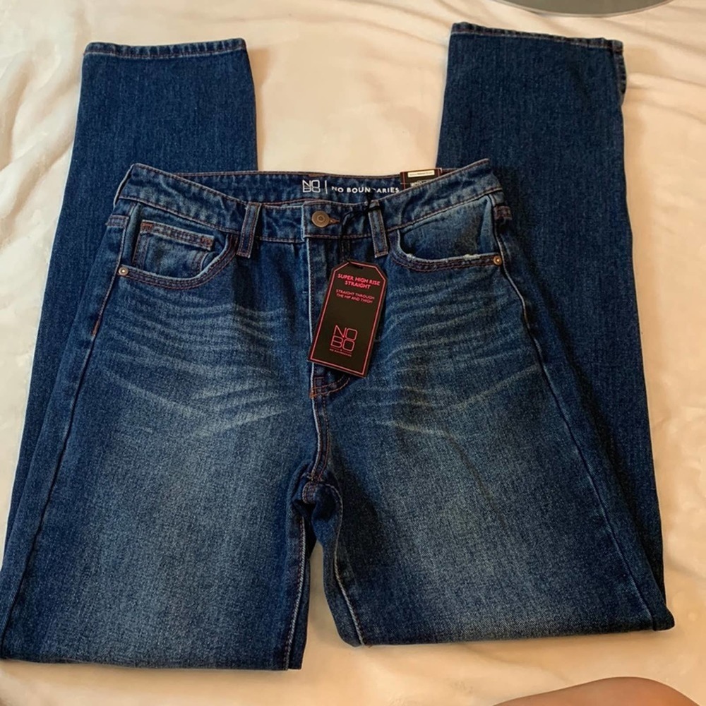 No Boundaries Super High Rise Straight Jeans with Distressed front bottom legs.